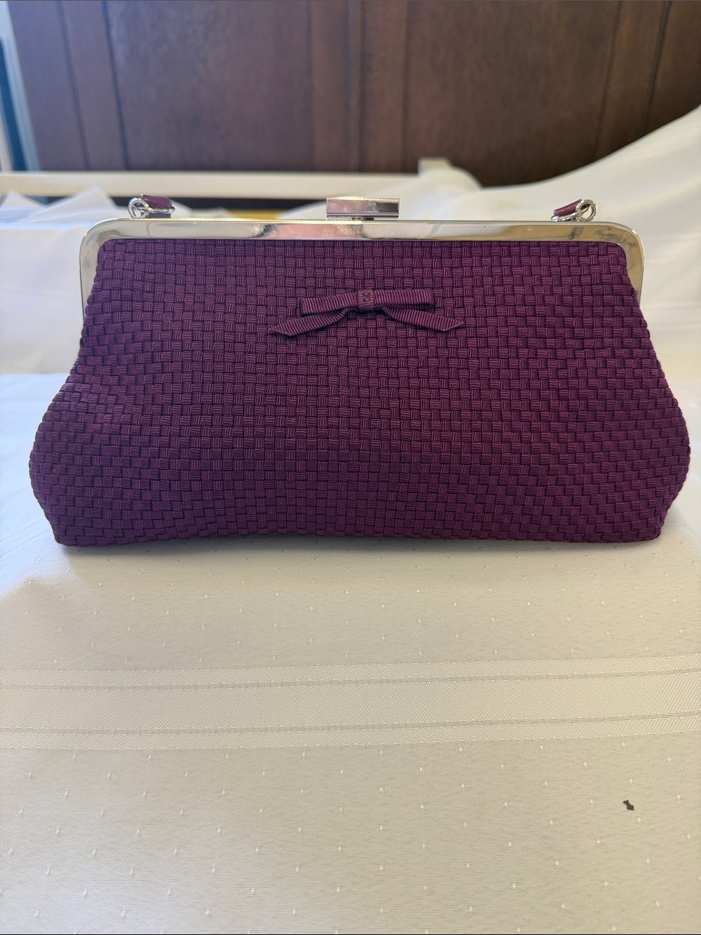 The Sak Purple Woven Frame Clutch with Bow Accent